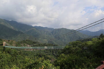 Fototapeta na wymiar suspension bridge in the moutain design for leisure oudoor activity 