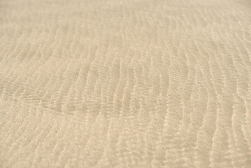 Fototapeta na wymiar Beach sand texture close up
