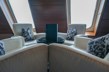 Elegant Art Deco interior design furnishing bar lounge area onboard ocean liner cruiseship cruise...