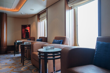 Elegant Art Deco interior design furnishing bar lounge area onboard ocean liner cruiseship cruise...