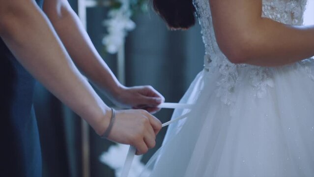 Bride's fees at an Armenian wedding, an Armenian bride puts on a dress