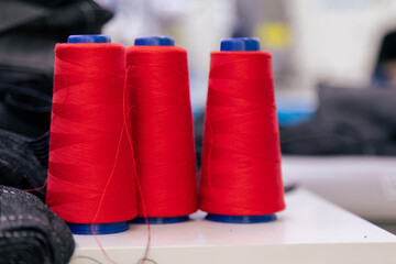 Red spool of sewing threads