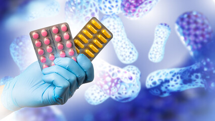 Vitamins for immunity. Hand with pills. Medicines containing probiotics. Bio active additives. Blisters with tablets before probiotics. Probiotics for immune support. Medical preparations. Art focus.