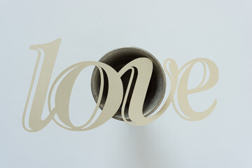 love isolated on a 3d metallic object