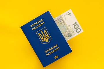 ukrainian passports and 100 zloty banknotes