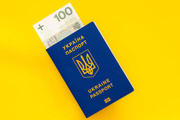 ukrainian passports and 100 zloty banknotes