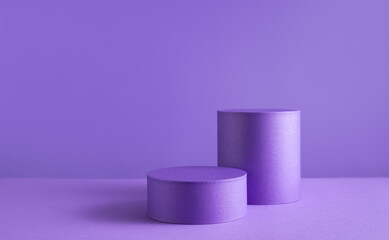 Halloween holiday concept. Podiums or pedestals for products display on purple background.