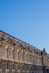 the facade of the classic european building in paris