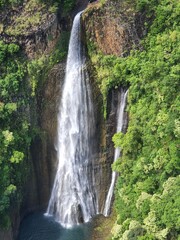Fototapeta na wymiar Hawaii waterfalls lush forest tropical