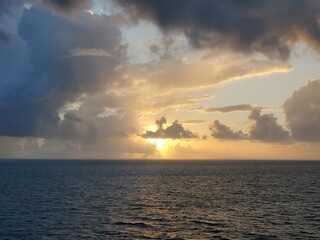 Sunset over Ocean Water Clouds