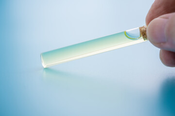 Small bottle with aromatic perfume with pheramones