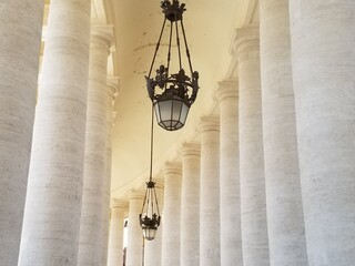 old lamps hanging in Vatican hallway 