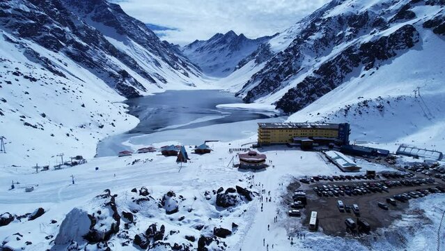 Santiago Chile. Ski station center at snowing Andes Mountains near Santiago Chile. Snow mountain landscape at winterness. Winter ness travel destination. Winter ness tourism travel.