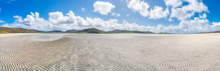 Wide panoramic view of Luskentyre Sands beach on the Isle of Harris, Scotland, UK