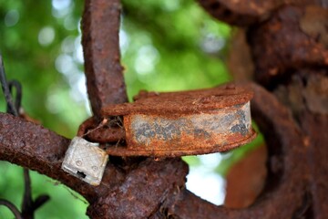 Venice: Rusted vintage lock on fence