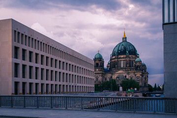 The exterior of modern Humboldt Forum and historic Berliner Dom during summer sunset © Michael Persson