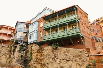 Ancient residential buildings on the edge of a steep cliff