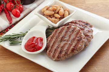 Grilled beef burger cutlet with sauce