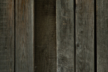 wooden background, wooden gray boards, board pass in the fence, old wood