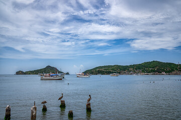 View of Carupano dock. Boats anchored near to shore. Sucre State, Venezuela