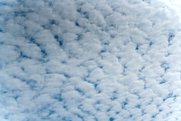 Fototapeta na wymiar Puffy clouds in the blue sky. High quality photo