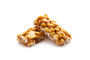 Kozinak from pistachios on a white background. Close-up