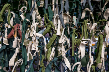 Camouflage net for the protection of military equipment in war.
