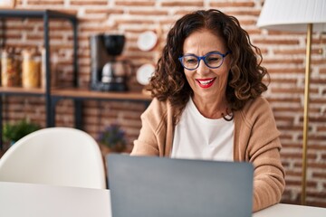 Middle age hispanic woman  at home