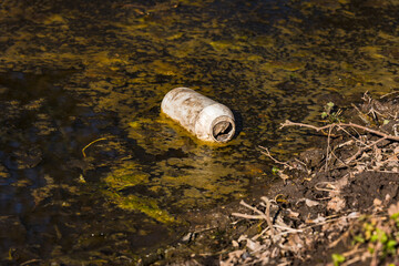 A discarded plastic bottle does not rot in nature