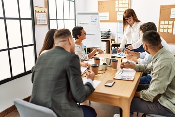 Group of business workers listening boss conference during meeting at the office.