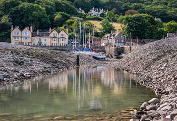 Sea inlet into Porlock Weir with yachts at low tide on the Bristol Channel