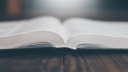 Open bible book pray. Holy bible book on the table. Pages