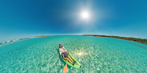 Aerial view kayak in the beach reef of Piana island, close to the Bonifacio town in Corsica of...