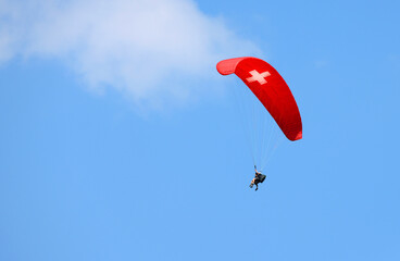 Paragliding in Interlaken, Switzerland. Interlaken is famous resort in paragliding flights.	