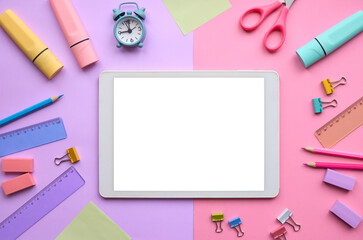 Digital tablet mock up template screen isolated on school stationery supplies pink pastel lavender trendy background flat lay. Online education, e learning apps, remote classes applications. Mockup