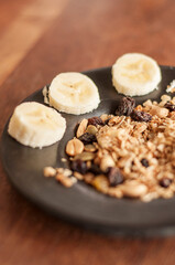 Banana, oats, raisins and almonds. Preparation. Vegan. Healthy.
