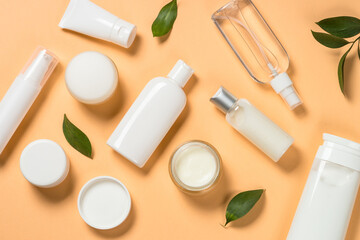 Natural cosmetic products. Serum bottles, cream, tonic and lotion for face and body care. Flat lay...