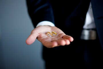 Strong men's hands and wedding rings
