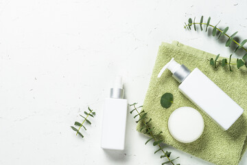 Natural cosmetic, skincare product. Eucalyptus cosmetic, spa product at white table.