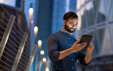 Rich successful eastern indian business man professional entrepreneur standing outdoors on street...