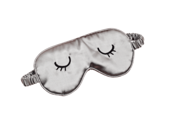 Sleeping mask and herbal tea on pink pastel background. Minimal concept of rest, quality of sleep, good night, insomnia, relaxation