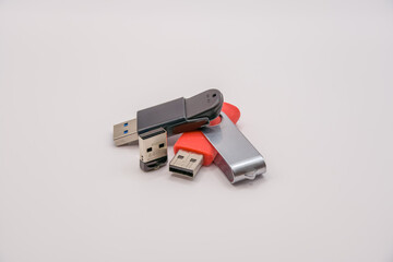 detailed close-up of three portable USB data storage device sticks 