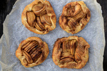 rustic traditional french biscuit cake with apples in autumn style, top view