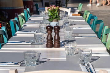 table setting for a dinner in a restaurant in the old town of pula, croatia