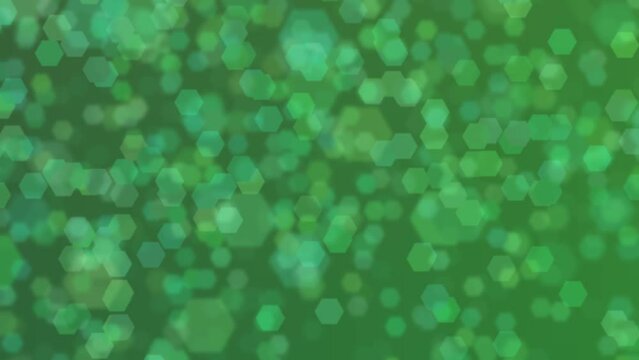 Motion graphics. forest green abstract defocused background, hexagon shape bokeh spots