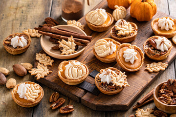 Mini pumpkin and pecan pies baked in muffin tin