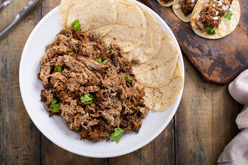 Mexican pork carnitas weith corn tortillas, ready to eat