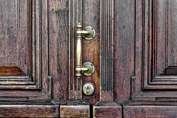 old wooden door of a townhouse with brass fittings in the old town of cologne - obrazy, fototapety, plakaty