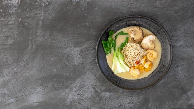 Stop Motion Animation of Building a Bowl of Ramen with Shrimp and Mushrooms