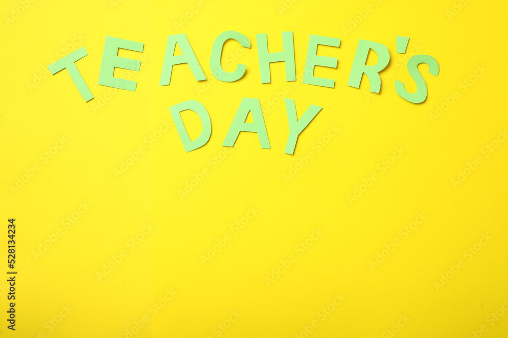 Poster Words TEACHER'S DAY on yellow background, flat lay. Space for text